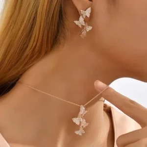 Matching butterfly earrings and ne...