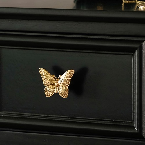 Gold butterfly drawer knobs