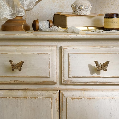 Gold butterfly drawer knobs